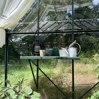 Väggmonterat omplanteringsbord